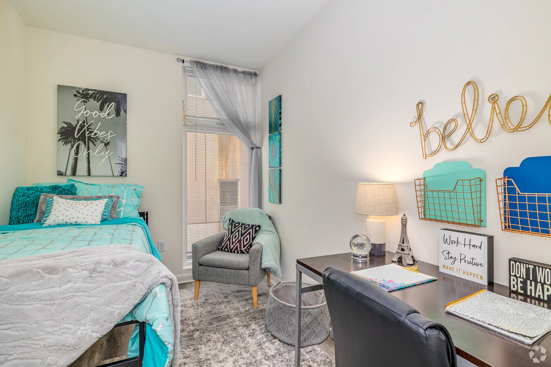 Furnished student bedroom with bed and decor at Temple Crossing