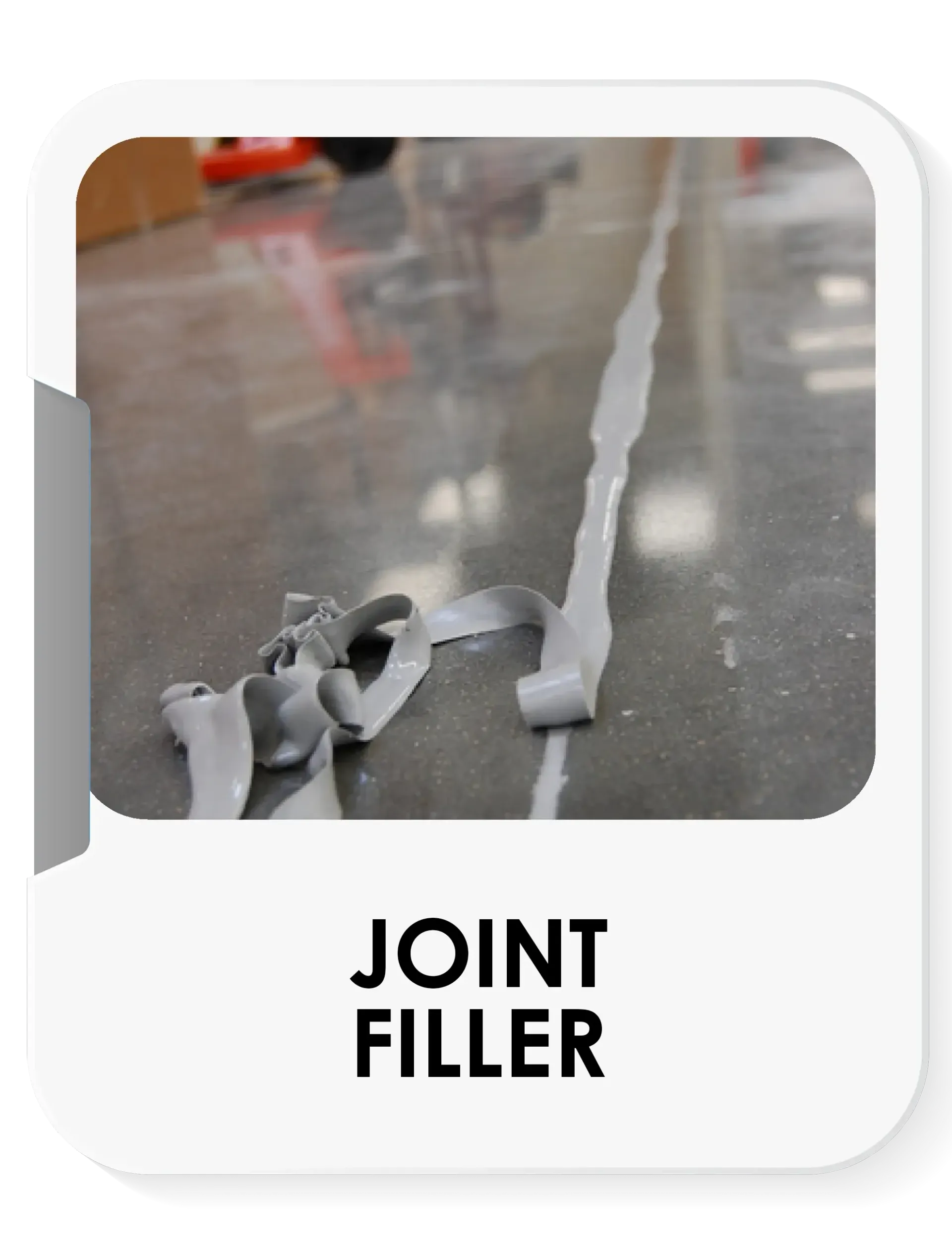 A picture of a joint filler on a concrete floor