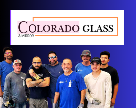 A group of men are posing for a picture in front of a colorado glass and mirror logo.