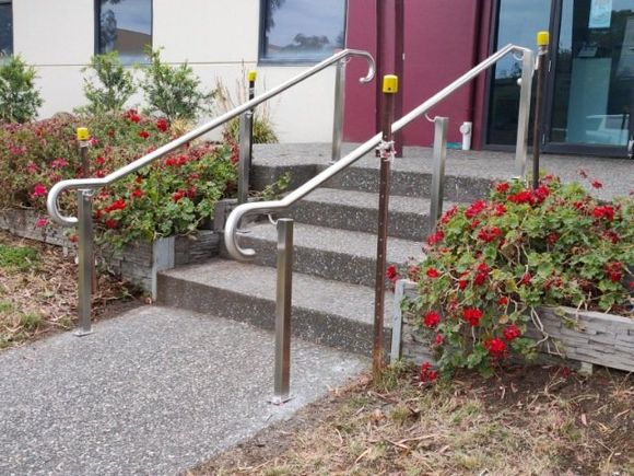 Stainless steel stair handrail on square posts