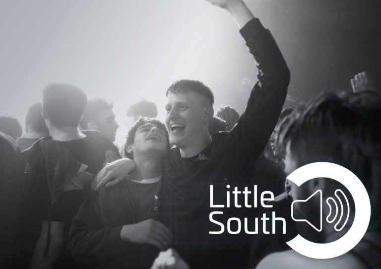 A black and white photo of a crowd with the words little south on the bottom