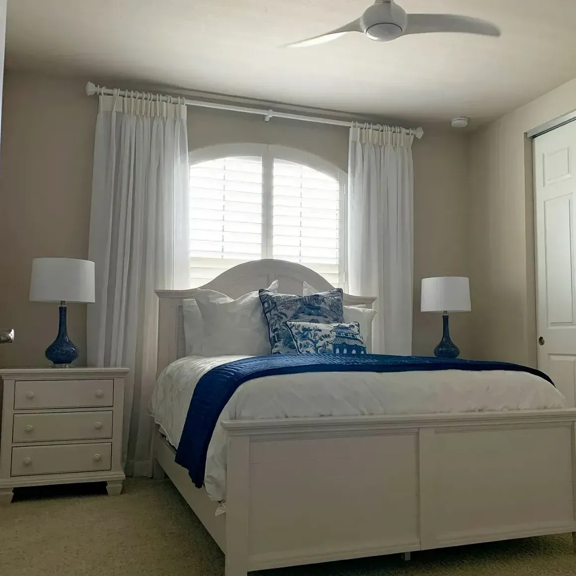 Bed with Elegant Blue and White Design — Naples, FL — Prestige Windows & Décor
