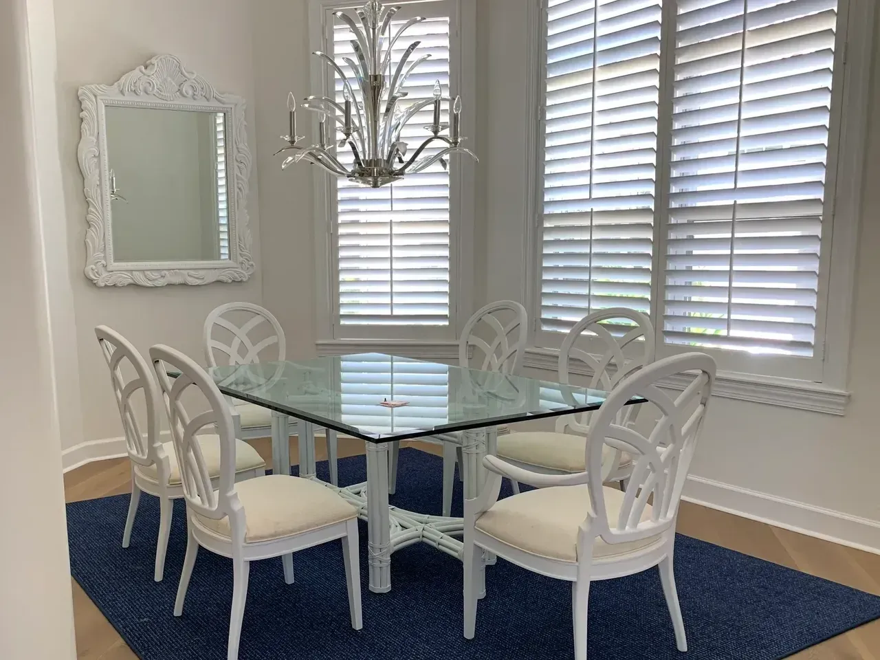 Luxury Table and Chair with Blue Carpet — Naples, FL — Prestige Windows & Décor