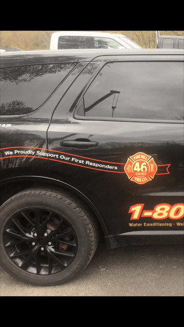 Side View  Of A Black Company Car — Arkville, NY — Titan Drilling Corp.