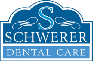 A blue sign that says schwerer dental care