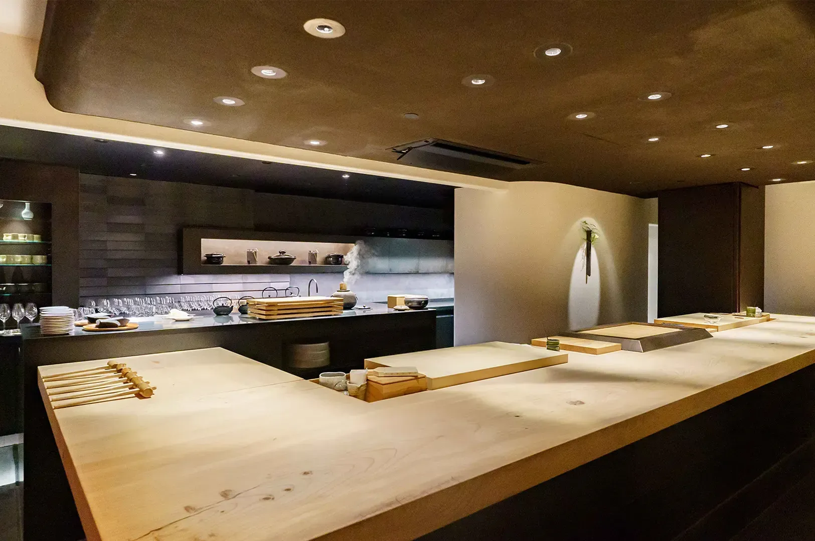 A minimalist, serene omakase bar interior, representing the deliberate structure and clear boundarie