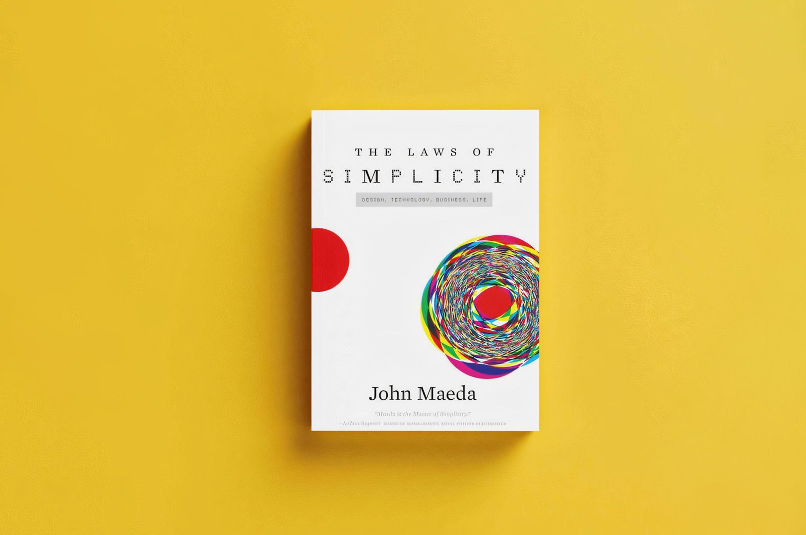 Minimalist book cover of The Laws of Simplicity by John Maeda displayed on a bright yellow backgroun