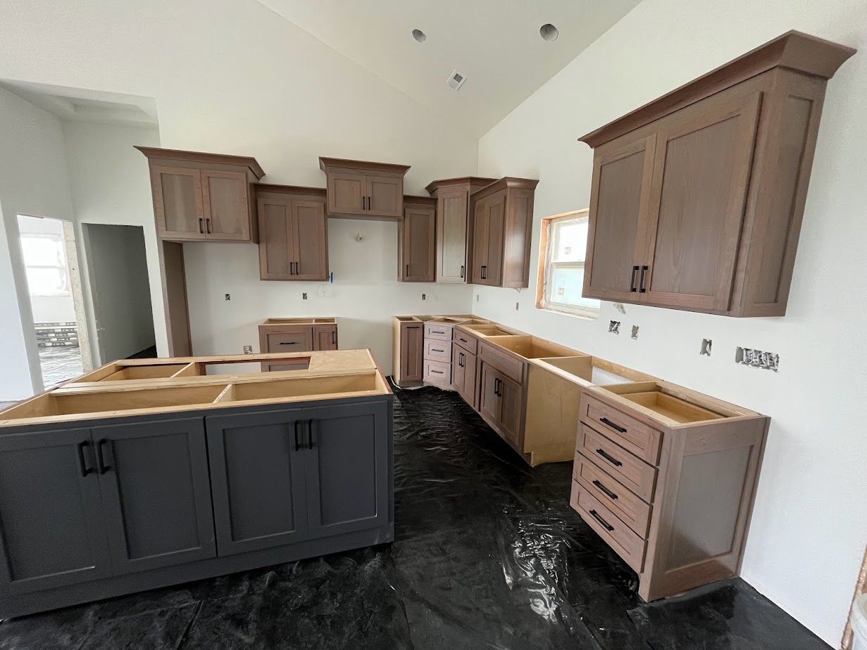 A kitchen with a lot of cabinets and a sink.