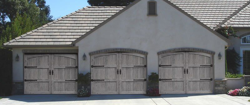 Nice Stucco Three Doors After — Diamond Springs, CA — Sierra Nevada Overhead Door