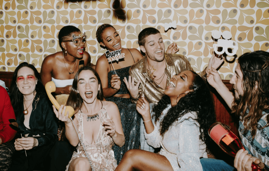 Friends using classic digital photo booth rental