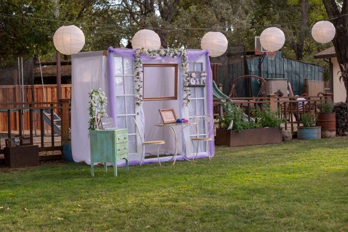 Fully customized background for photo booth rental at a house party