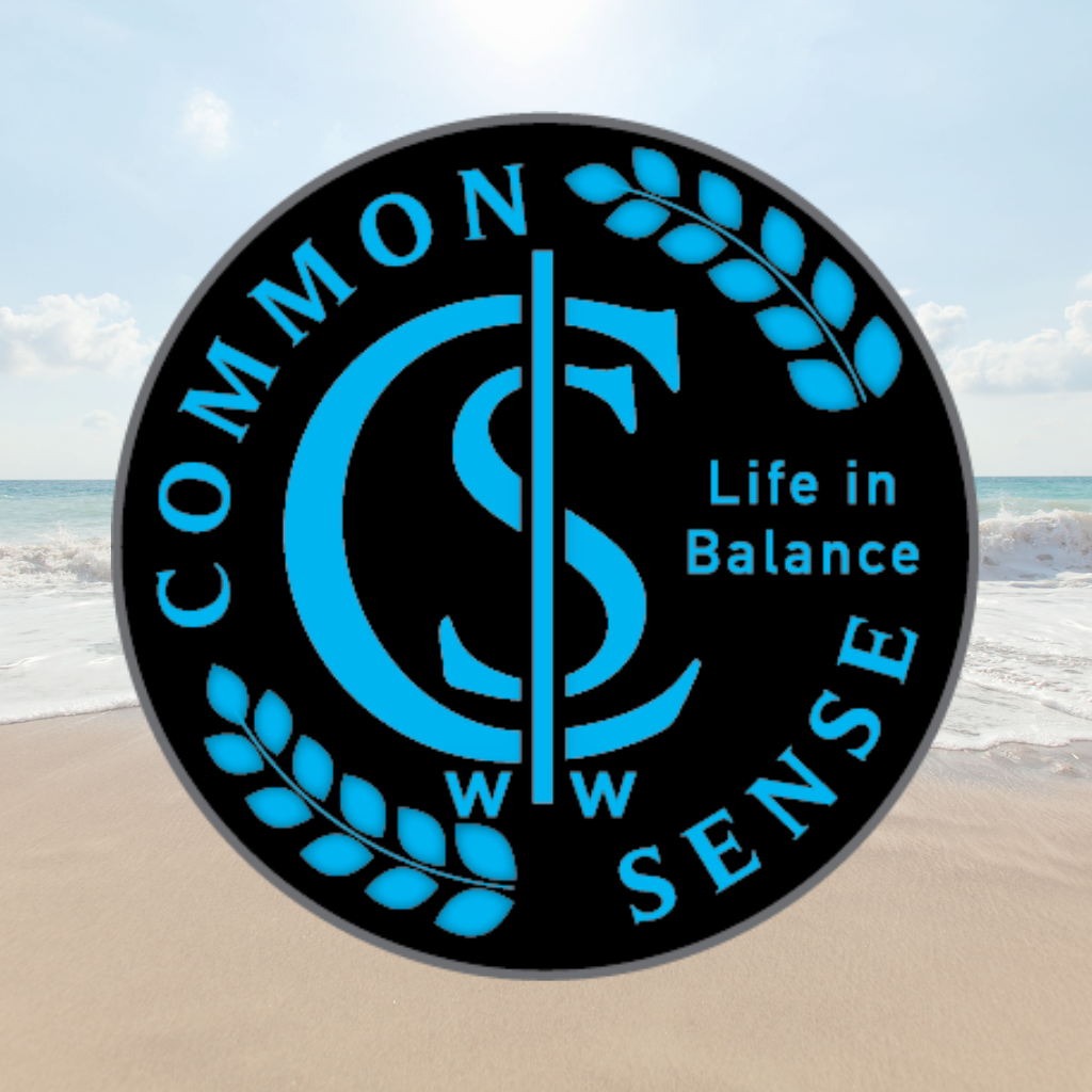 A logo for common sense with a beach in the background