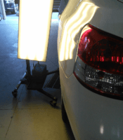 White Car Dent Repair with LED Lighting After — Taren Point, NSW — CJ's Dent Removal