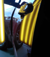 Red Car Dent Repair with LED Lighting After — Taren Point, NSW — CJ's Dent Removal