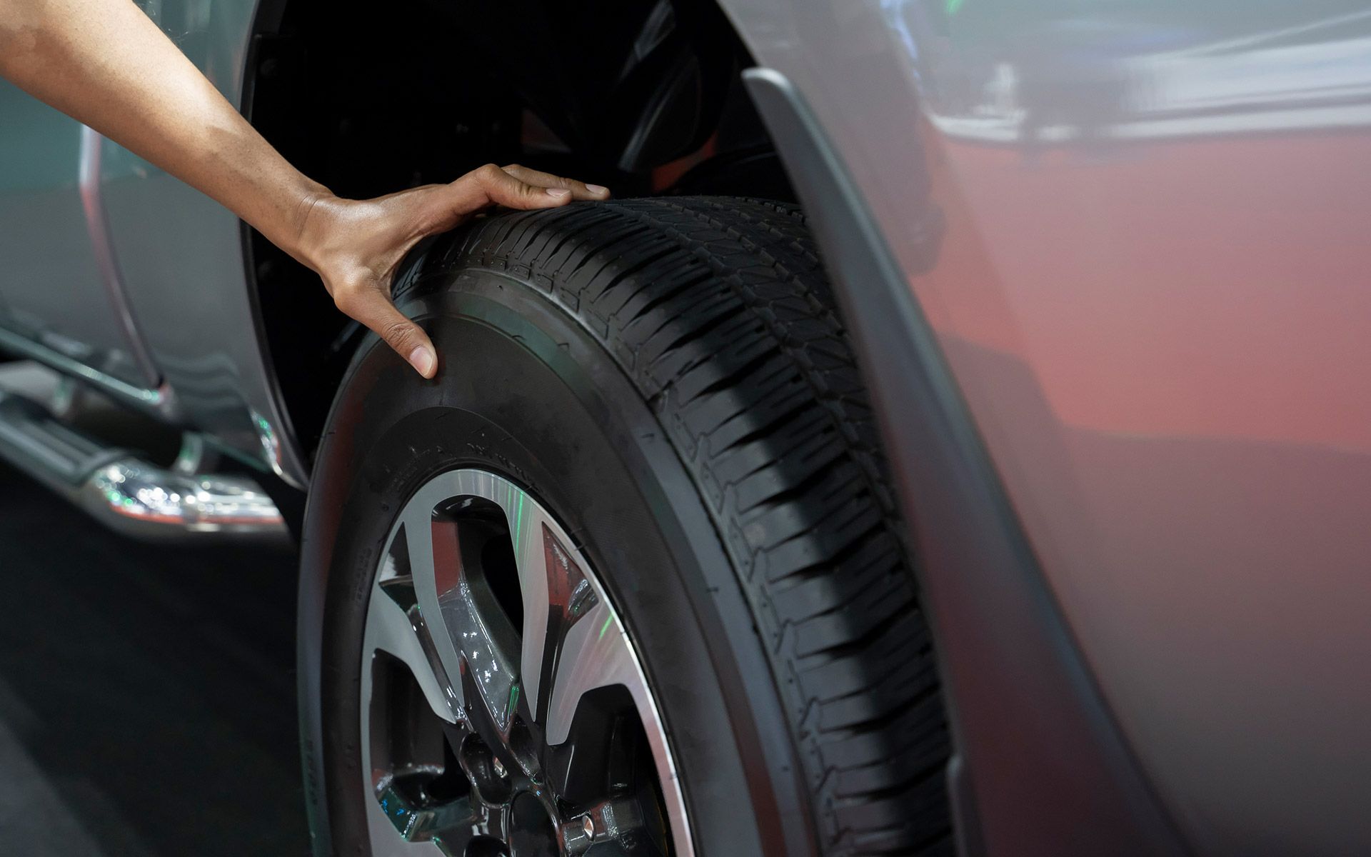 Checking Car Tire — Westover, AL — Taylor Automotive And Towing
