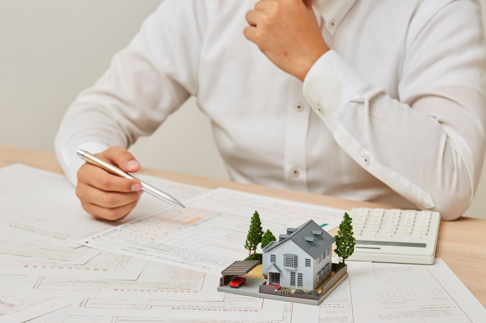 The inside of a moving truck filled with boxes and blankets.
