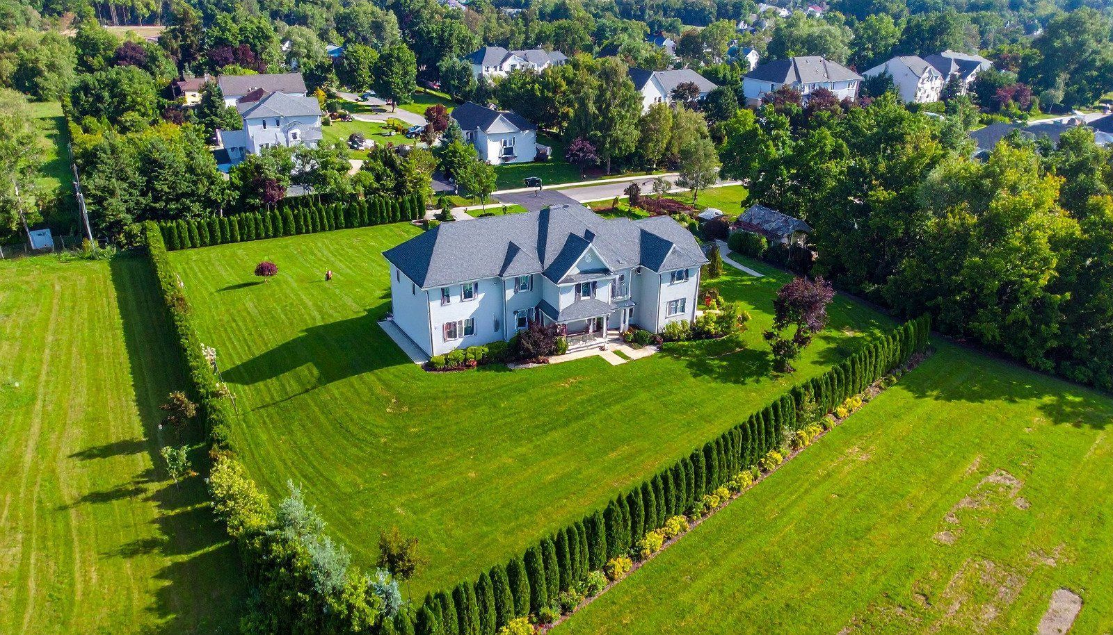 The inside of a moving truck filled with boxes and blankets.