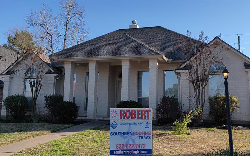 A house with a robert sign in front of it.
