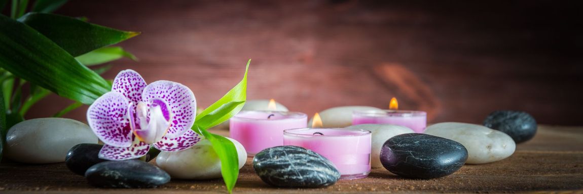 candele e pietre da massaggio