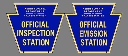Two blue and gold keystone signs: 