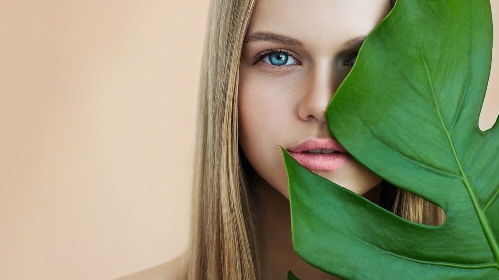 Blond Woman Leaf Covering Face - On Point Cosmetic Tattoo Studio in Buderim, QLD