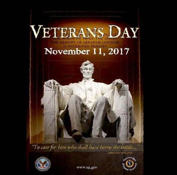 A poster for veterans day shows a statue of abraham lincoln