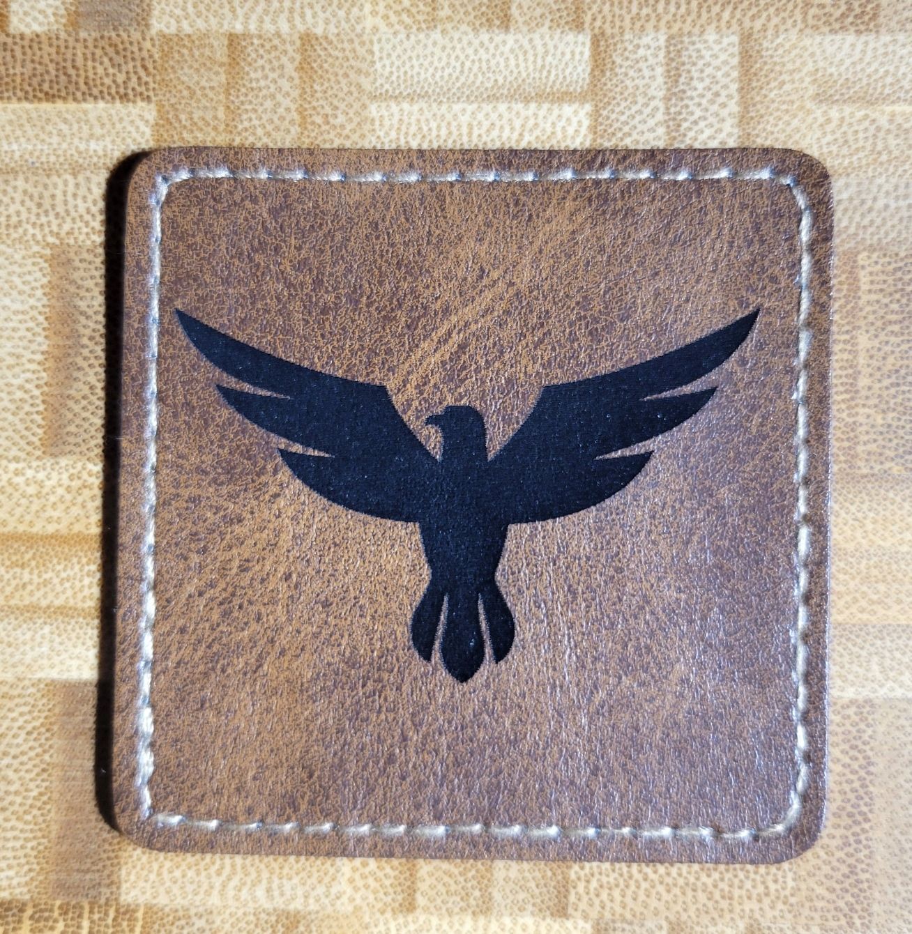 Egale Iron on patch (Dark Brown)