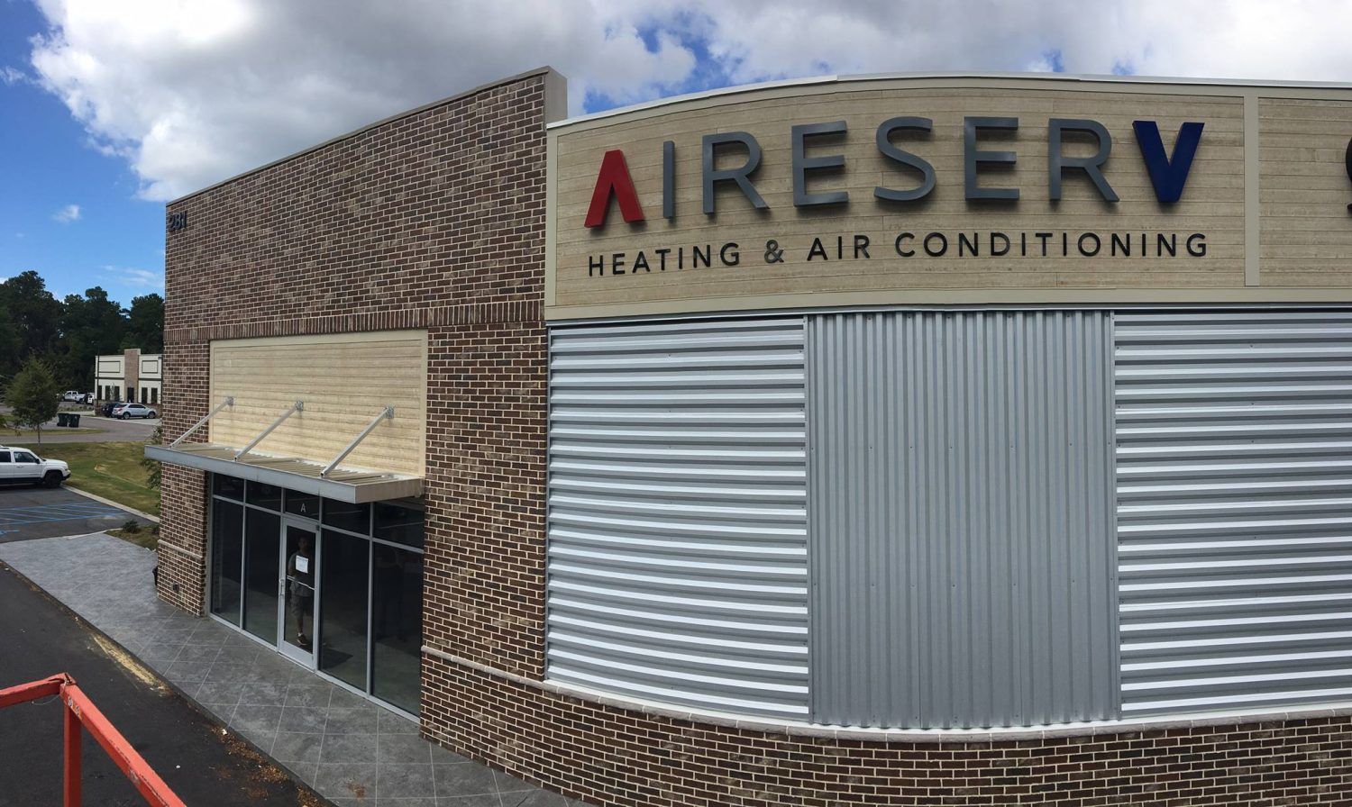 A building with a sign that says aireserv heating and air conditioning