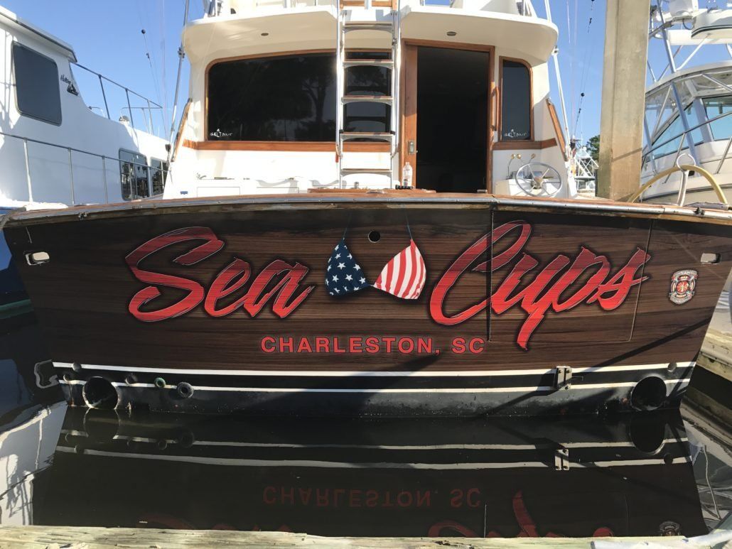 A boat with the name sea clips on it
