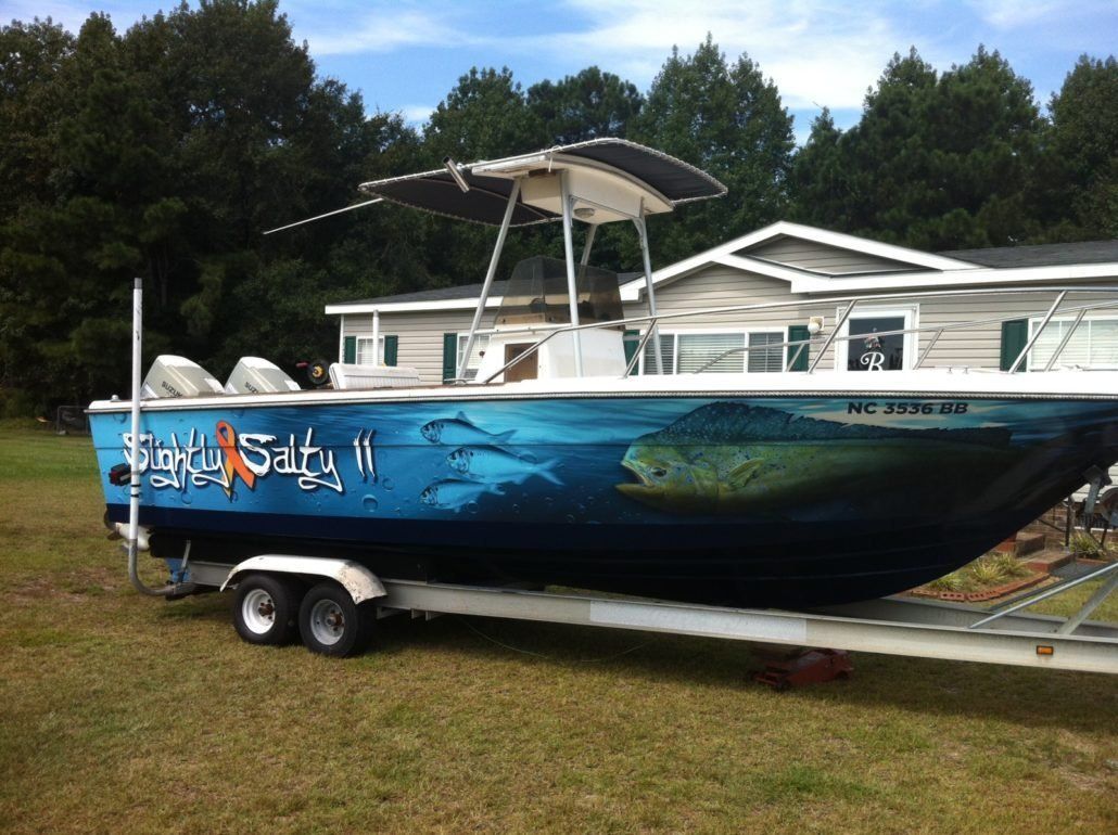 A boat on a trailer that says eagle salty