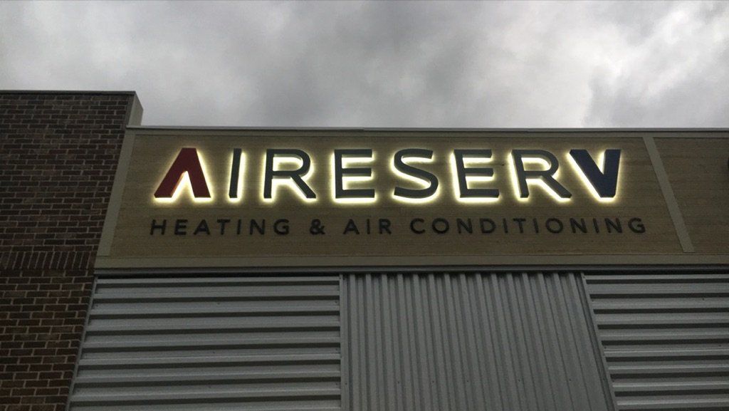 A sign for aireserv heating and air conditioning