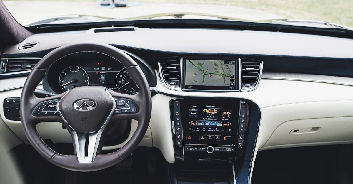 The interior of a car with a steering wheel and dashboard. | Brubaker's Auto Repair