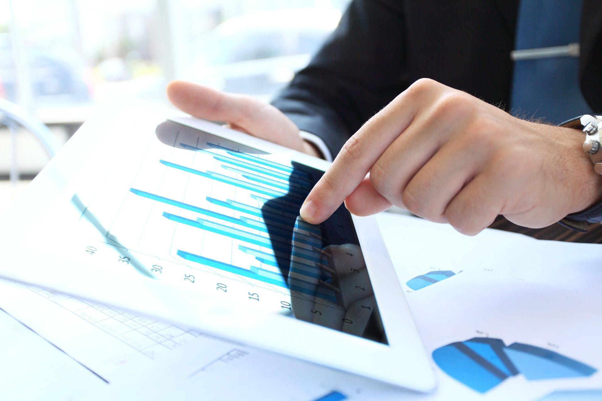 Digital marketing analytics on tablet showing campaign metrics