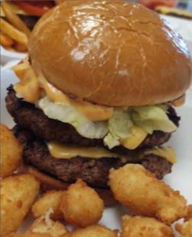 Double Patty Burger with lettuce and potato tots