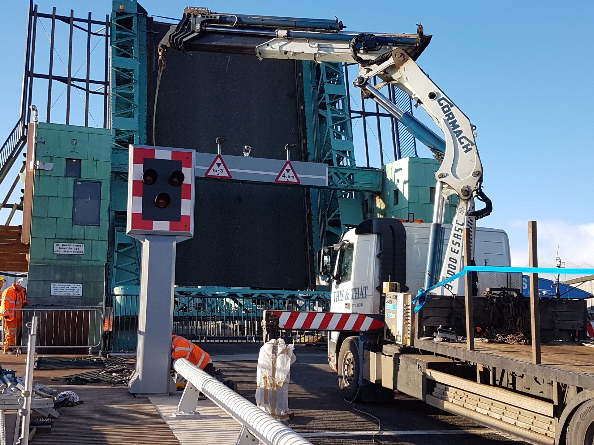 lorry crane used for carrying materials at construction site
