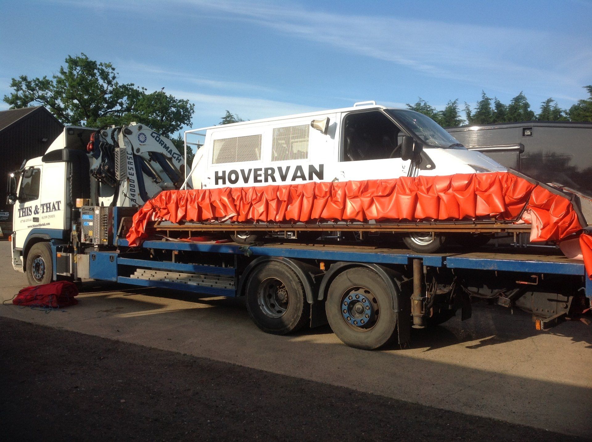 lorry crane carrying hovervan