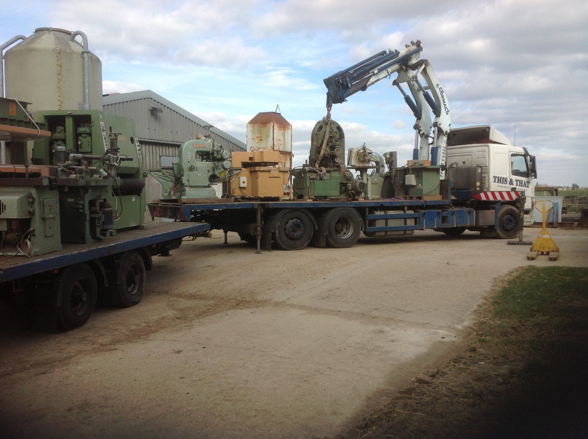 lorry crane moving industrial machinery