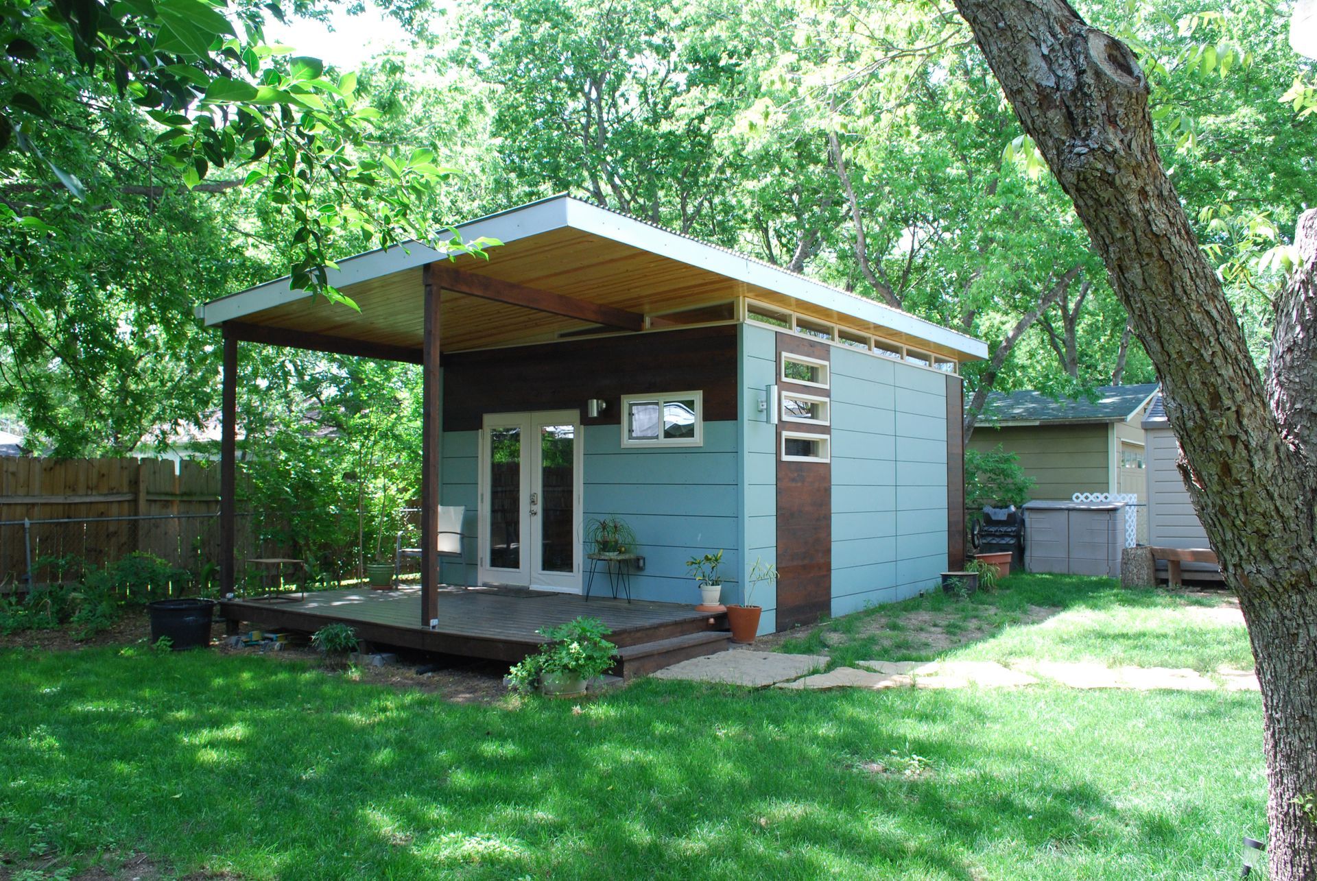 A small ADU in a backyard.