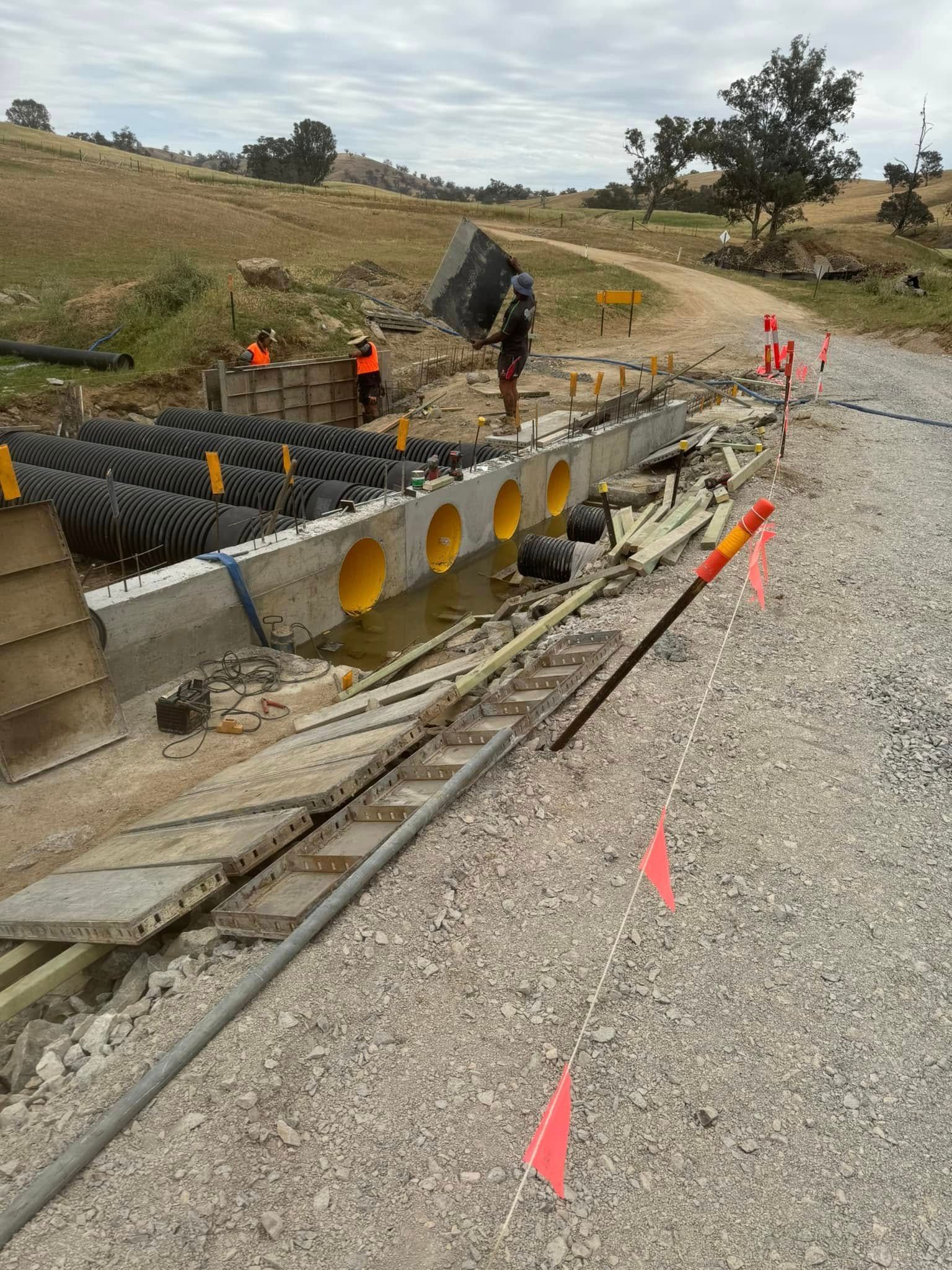 An Aerial View of a Group of Construction Workers Laying Concrete — Next Level Construction Contractors in Gundagai, NSW