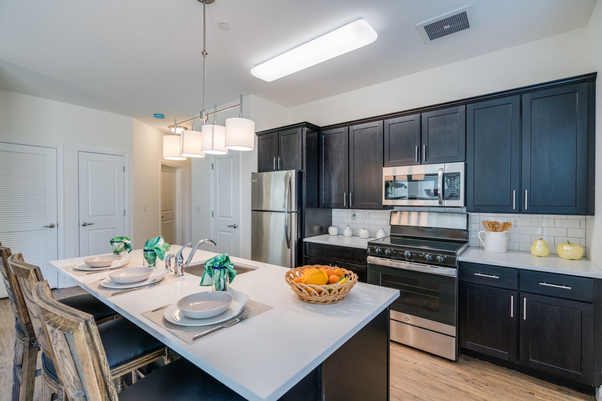 Modern photo of kitchen and kitchen island