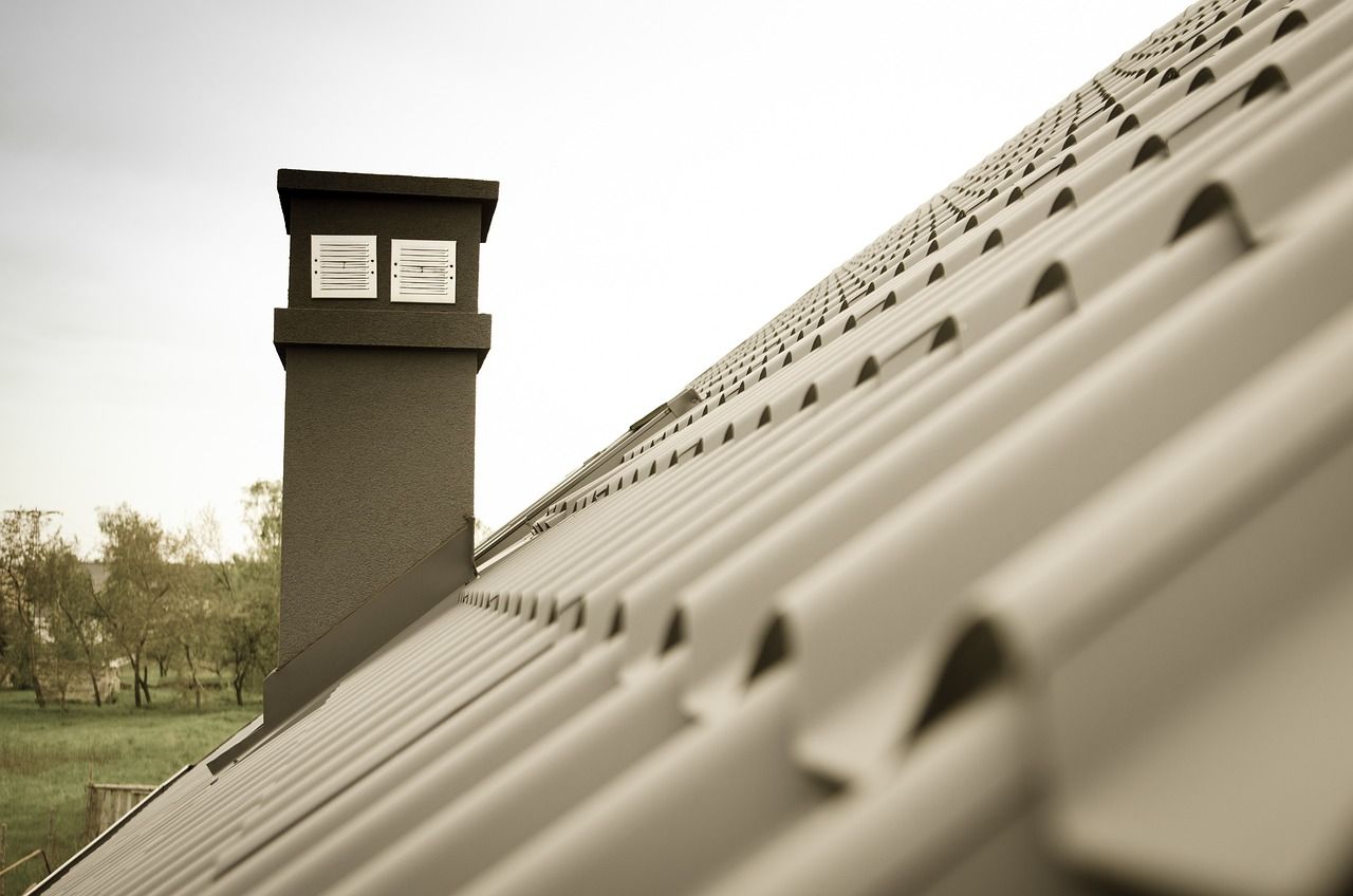 A roof with a chimney on top of it