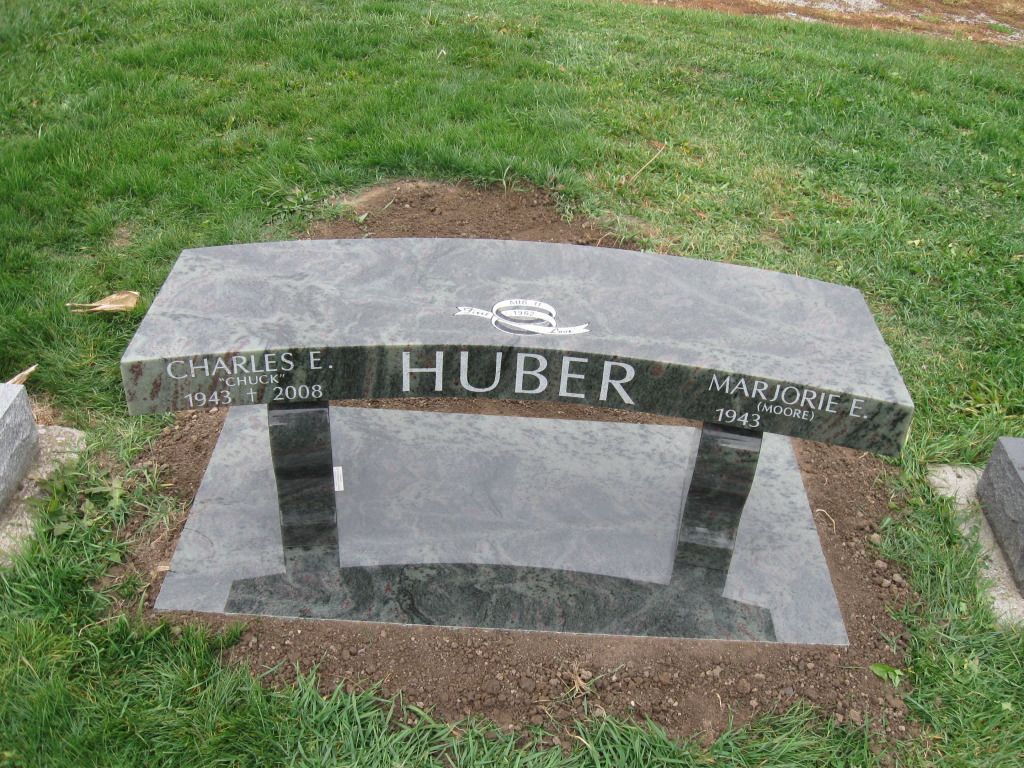 a grave of charles e huber and marjorie e.