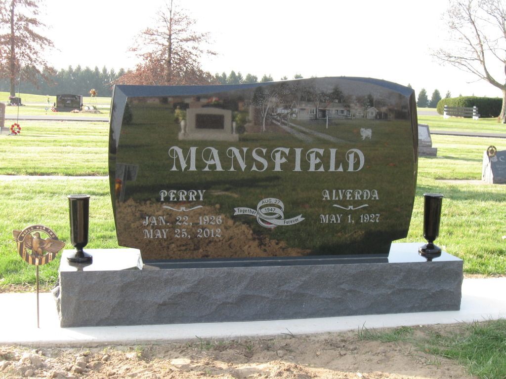 a gravestone for perry mansfield is in a cemetery