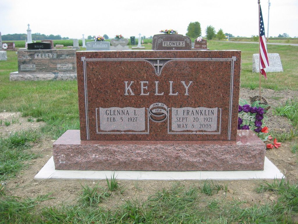 a grave of kelly and glenna l. in a cemetery