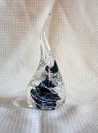 a close up of a glass sculpture on a table .