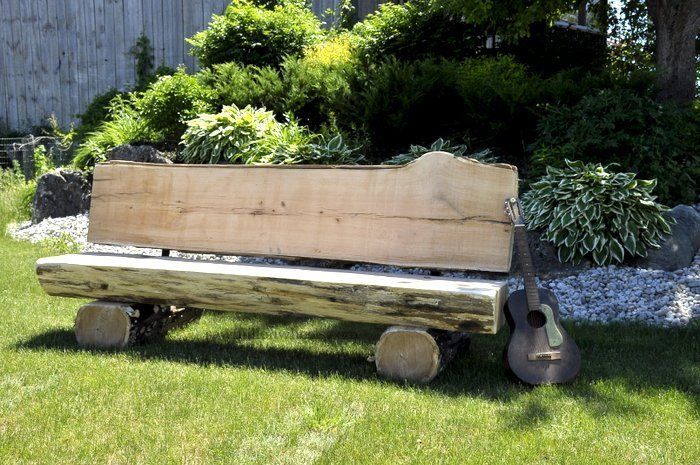 Log bench made in the Sawmill On Wheels live edge shop.