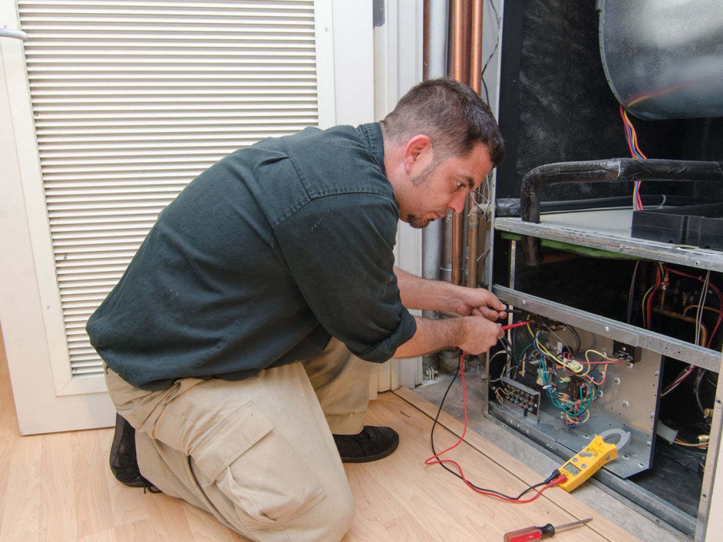 Man Repairing Home Appliance