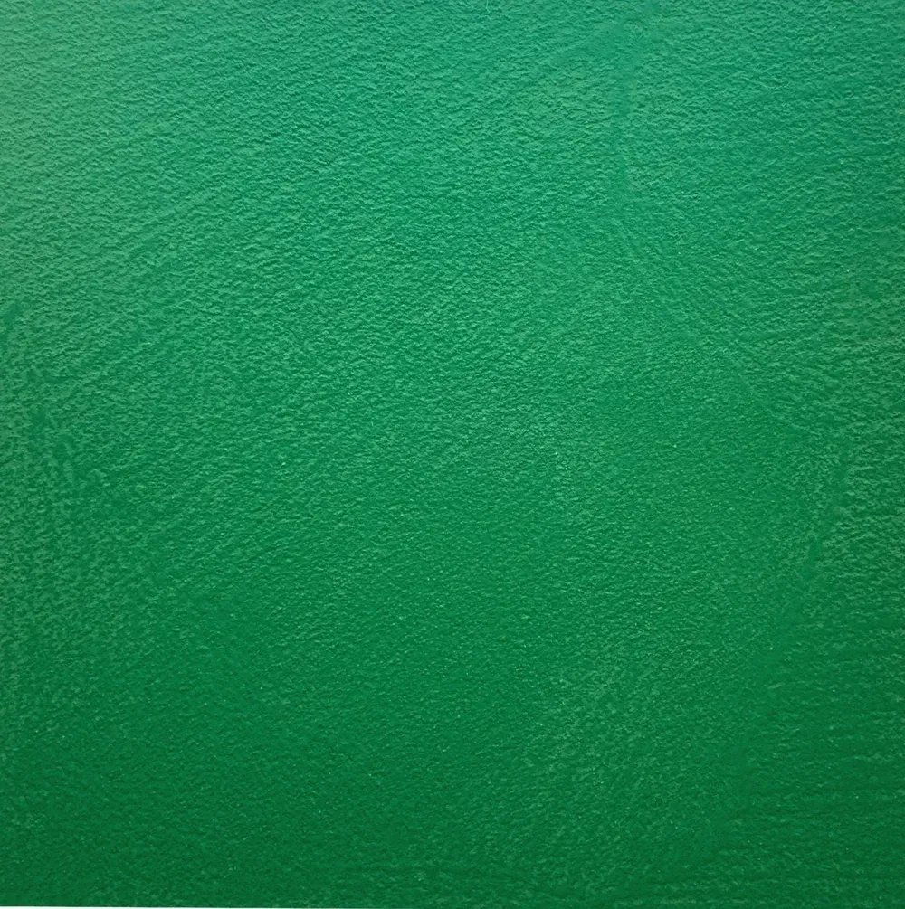Green textured surface.