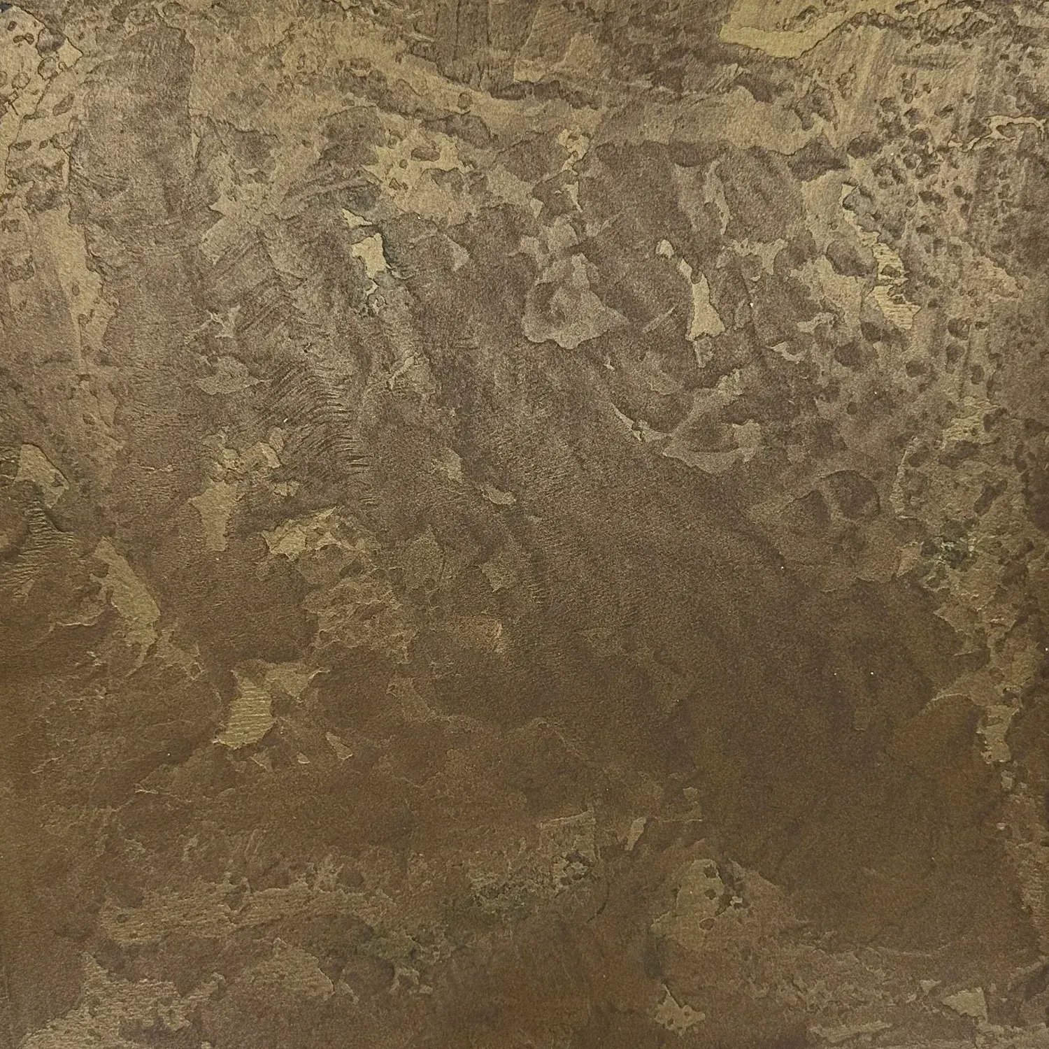Textured brown and gold wall surface.