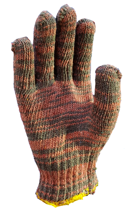 A close up of a knitted glove on a white background.